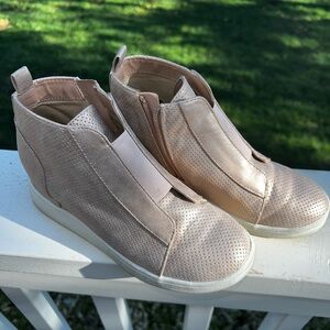 Light pink, shinny, fashionable kids shoes with a heel built in